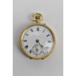 A 20th century 18ct gold ladies open faced keyless wound fob watch having a floral engraved case