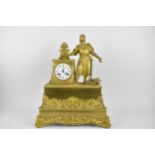 A 19th century French brass cased 8 day mantle clock, the case decorated with a figure, possibly