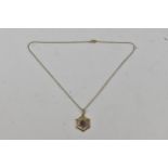 An Edwardian 9ct gold pendant and chain link necklace, total weight 4.35g