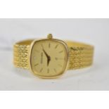 A vintage ladies 9ct gold cased Quartz Bueche Girod wristwatch having yellow metal baton hour