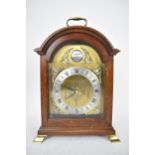 A late 20th century Garrard London mantel clock in mahogany case, dial with silvered chapter ring