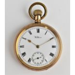 A vintage gold plated open faced pocket watch having a white porcelain dial, signed Waltham with