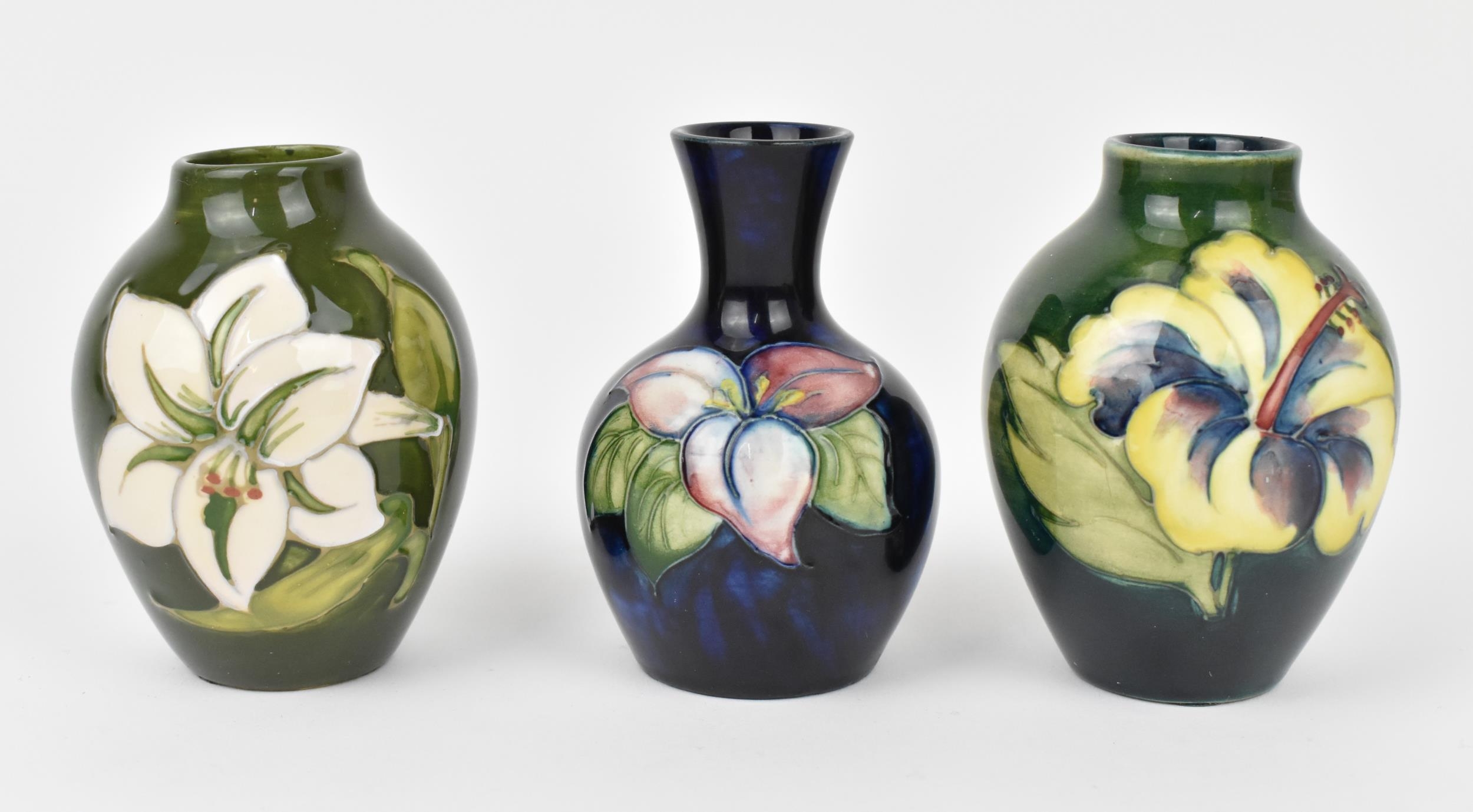 A small collection of Moorcroft ceramic vases, to include 'hibiscus', 'Bermuda Lily' and ' - Image 4 of 4