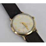 A vintage 1964 gents gold plated Automatic Bulova having a silvered dial with Arabic numerals and