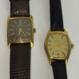 A pair of ladies gold plated manual wind Omega wristwatches to include an Omega De Ville having