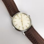 A gents circa 1965 stainless steel manual wind Omega wristwatch, having a silvered dial with Roman