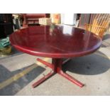 A vintage rosewood veneer circular dining table, 73cm h x 148cm w Location: