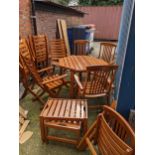 A Herlag West German folding garden table and two sets of four folding chairs, and two matching