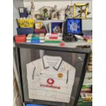 A mixed lot to include a signed Manchester United football shirt framed, ceramics, lamps, china