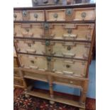 A marriage between a mid 18th century oak chest on a 19th century oak stand, 138cm h x 95cm w x 54cm