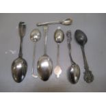 A selection of silver spoons to include one having the handle in the form of a golf club, 116g