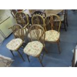 A set of five vintage elm seated Windsor wheel back dining chairs Location: