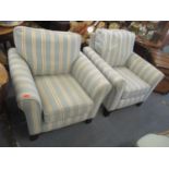 A pair of modern blue upholstered armchairs Location: