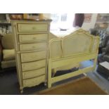 A modern French style tall chest of seven short drawers, together with a matching headboard