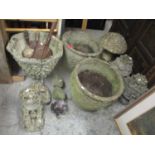 A selection of garden planters and ornaments to include a pair of circular planters with moulded