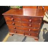 A 19th century mahogany chest having a brushing slide above two short and three long drawers,