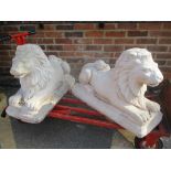 A pair of garden stoneware large lion ornaments 50cm h x 72cm w Location: