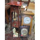 Small furniture to include a plant stand, two clocks and a composition lamp Location: