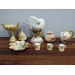 Royal Worcester blush ivory glazed porcelain to include two miniature mugs, a flat back jug, a