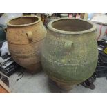 Two large terracotta olive pots of baluster form and with three handles 99cm h x 70cm w