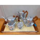 A 1950s Picquot Ware stainless steel and treen tea service with additional piece Location: 2.2