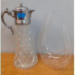 A silver plated and cut glass water jug, together with a contemporary glass decanter Location: 2.2