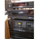 A Technics stereo with a record player ad a pair of Pioneer speakers in a teak cabinet Location:RAF