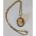 A cameo brooch in a 9ct gold mount, on a 9ct gold necklace, total weight 13.2g Location: cab