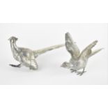 A pair of early 20th century German silver cock and hen pheasant table ornaments, possibly Hanau