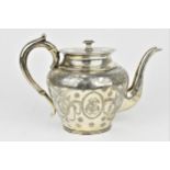 A Victorian silver teapot by Horace Woodward & Co, London 1778, of tapered form with flat hinged