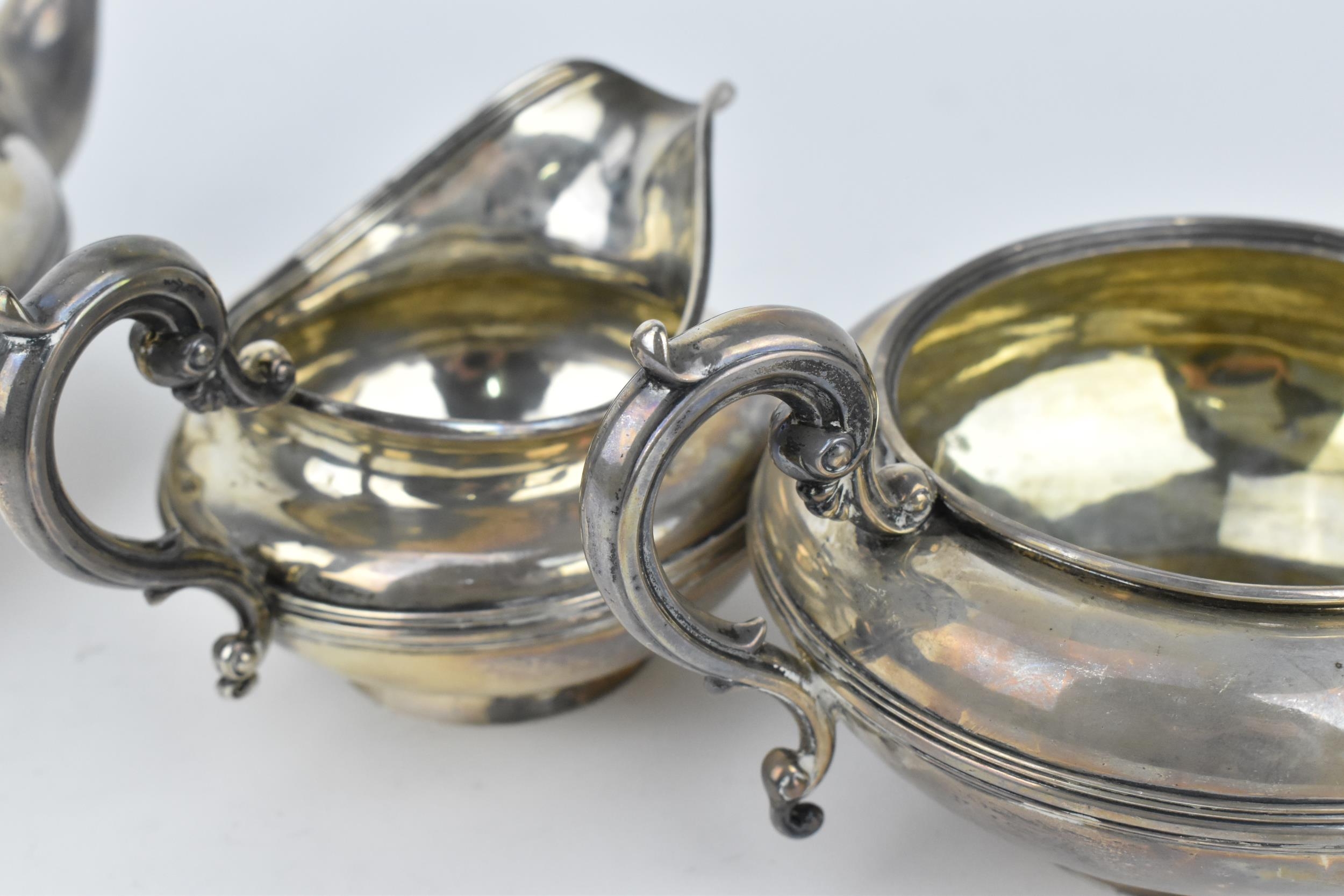 A late Georgian silver tea set by Charles Gordon, London 1834, comprising a teapot, twin-handled - Image 6 of 6