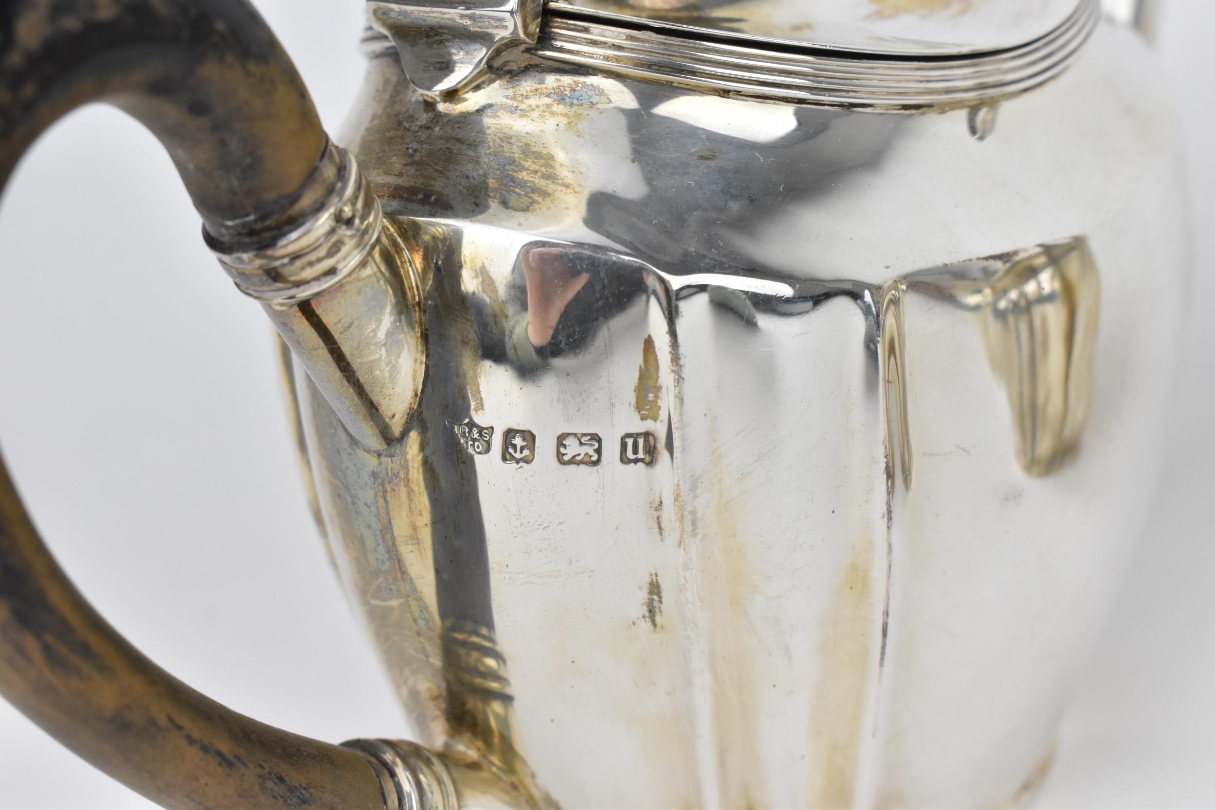 A George V silver three piece tea set by S Blanckensee & Sons Ltd, Birmingham 1919, comprising one - Image 2 of 5