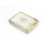 A Victorian white and gilt metal card case, of rectangular form, the hinged case with delicate