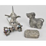 A small collection of Continental white metal items to include a hollow box modelled as a beast with