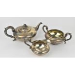 A late Georgian silver tea set by Charles Gordon, London 1834, comprising a teapot, twin-handled