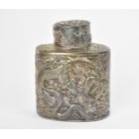 A Chinese export metal tea caddy, extensively decorated with two dragons and flaming pearl over