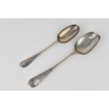 Two early Georgian silver spoons in the Hanoverian pattern, the desert spoon dated for George II,