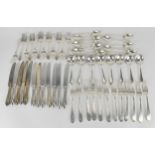A set of sterling silver cutlery, possibly American, comprising twelve salad forks, twelve fish