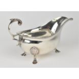 A George VI silver sauce boat by Harrison Brothers & Howson, Sheffield 1936, with gadrooned rim, c