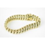 An Italian 14ct yellow gold bracelet, with thick flat links and open box clasp, stamped 14KT,