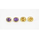 Two pairs of yellow metal and gemstone earrings, comprising a pair with oval cut citrine, the