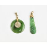 Two yellow metal mounted spinach jade pendants, to include one as a drop with pierced and carved