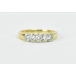 An 18ct yellow gold five stone diamond ring, each round cut diamond roughly 1/16th of a carat (0.