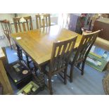 A 1930's oak draw leaf extending dining table, 72.5cm h x 119cm w, unextended, together with four