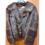 A chestnut brown dyed rabbit fur jacket, 38/40" chest x 23" long Location: RWM