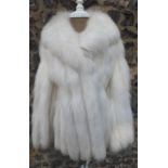 A white arctic fox swing jacket together with a vintage Saga fox jacket Condition: Arctic fox jacket