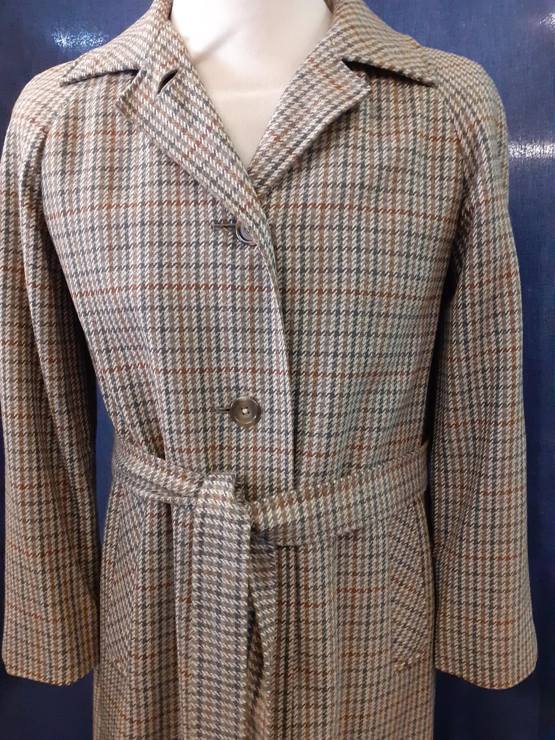 Aquascutum- A 1970's woollen coat in iconic tweed, 38" chest x 47" long, with 2 front pockets and - Image 2 of 9