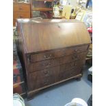 A Georgian mahogany bureau having a fall flap above four graduated drawers and ogee feet, 109cm h