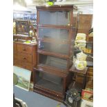 An early 20th century Globe Wernicke bookcase having five glazed doors, 211.5cm x 86.5cm w Location: