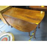 A Georgian mahogany gateleg dining table having single inset drawer and pad shaped feet, 70cm h x